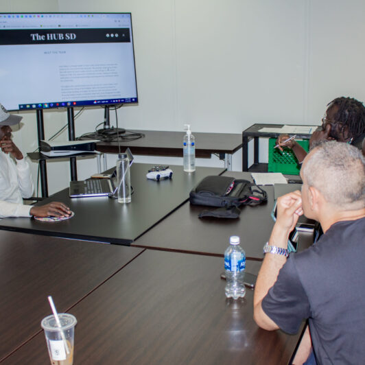 people-looking-at-screen-in-meeting